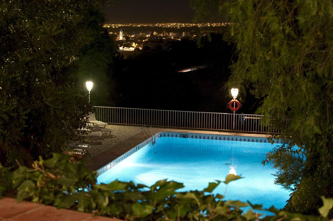 Views over town and sea at night